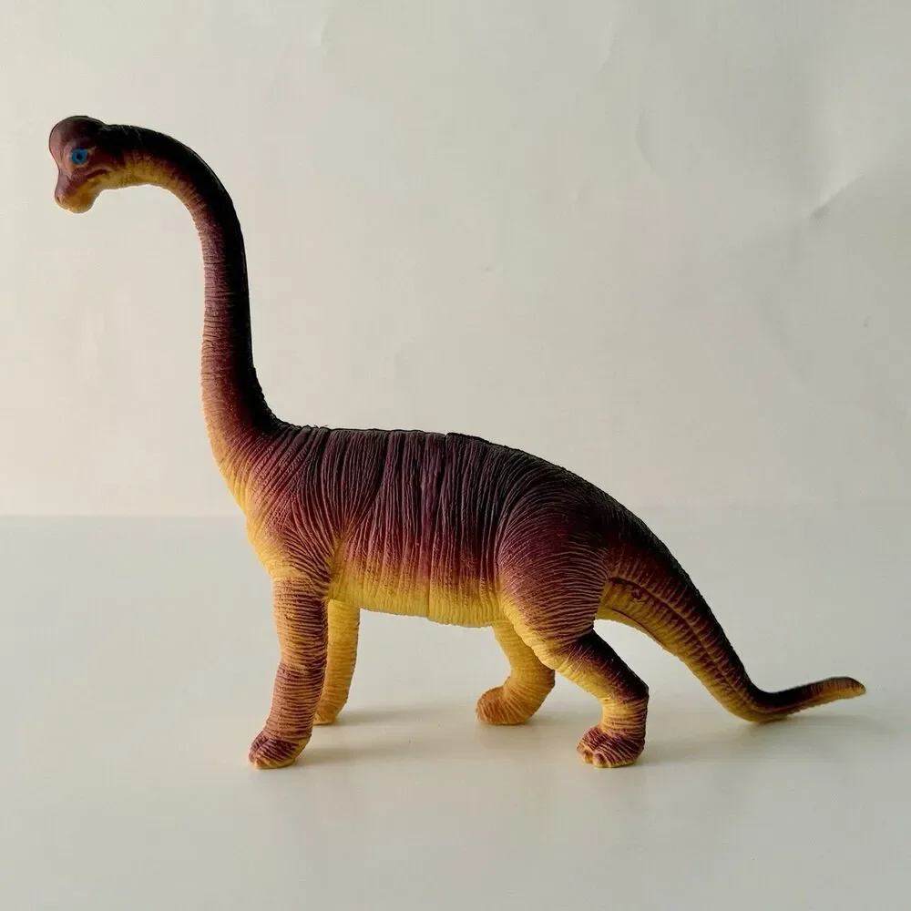 Lot of 4 Vintage Assorted Dinosaurs Plastic/Rubber Embossed - Up to 8.5